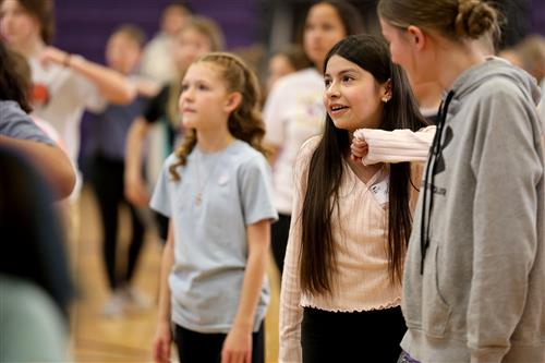 show choir kids camp doing choreography